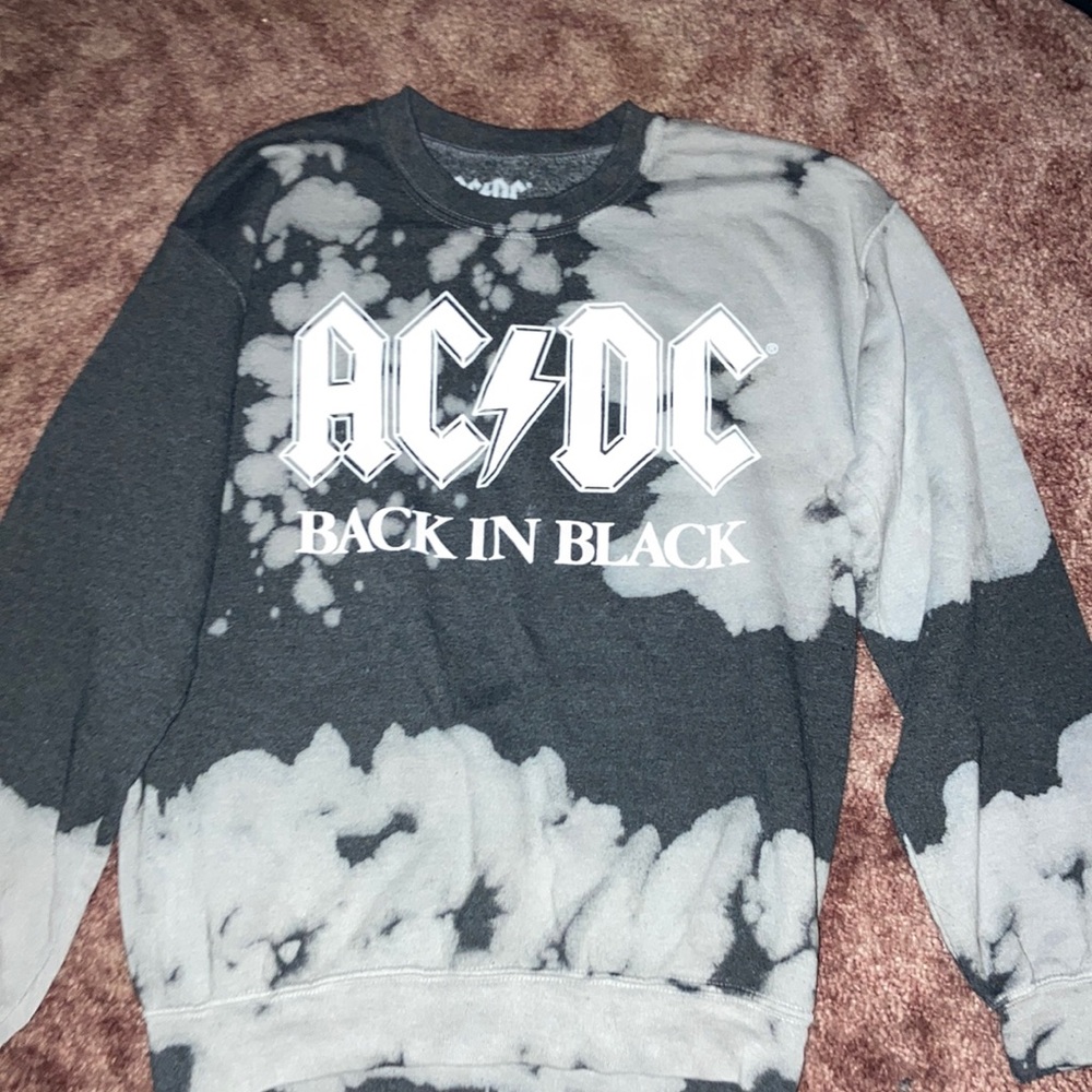 A black and grey tie-dye hoodie.